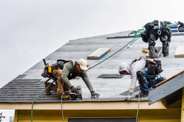 Professional Roofing technician working in Medford, OK